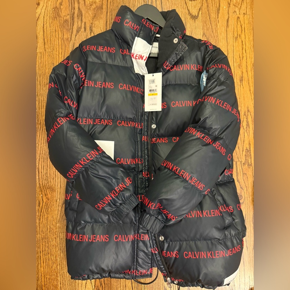 Calvin Klein Jeans Black Puffer Jacket with Red Logo